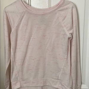 Kid’s pink and white sweater